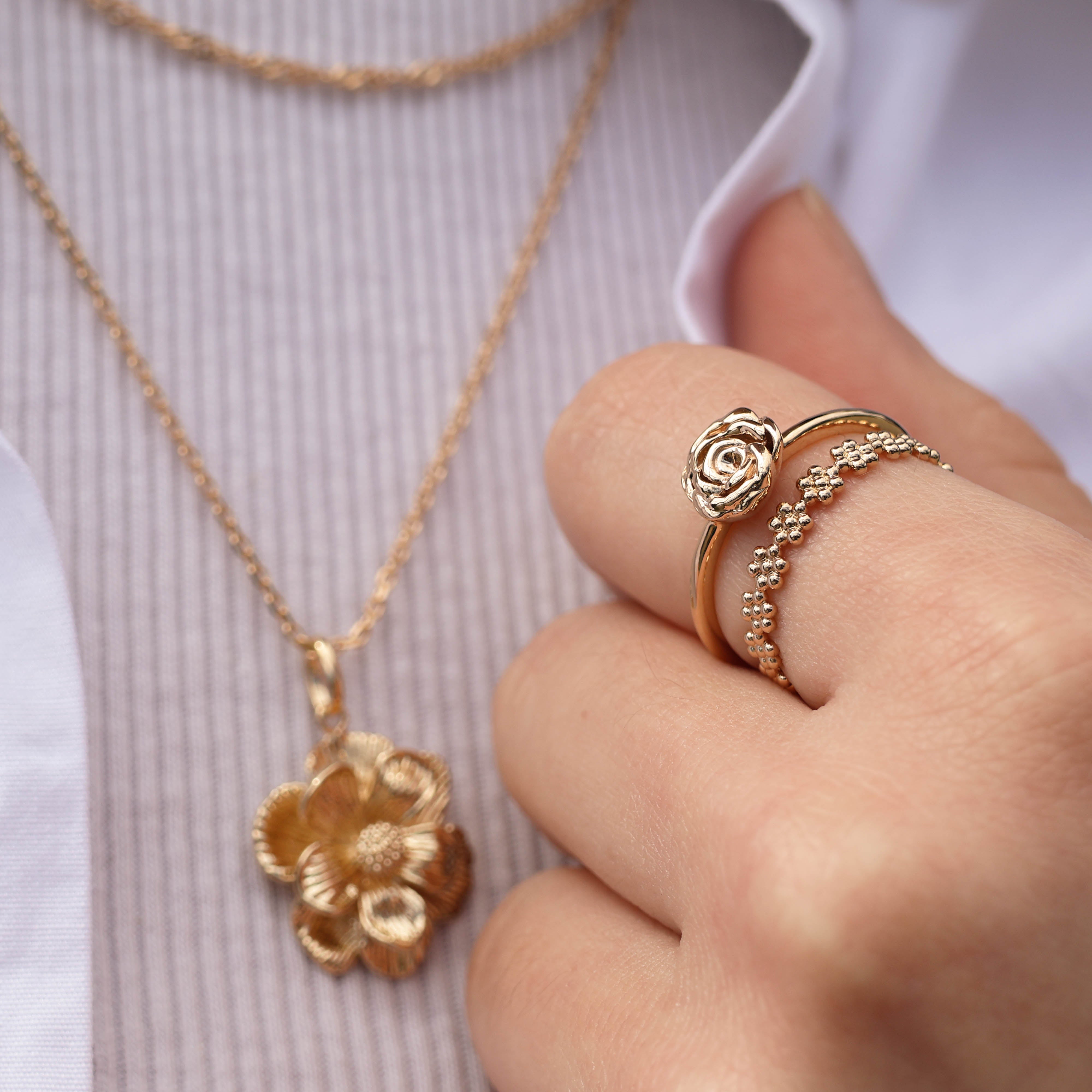 Bague Flora fines boules motif fleurs plaqué or